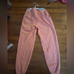 Peloton coral colored sweatpants